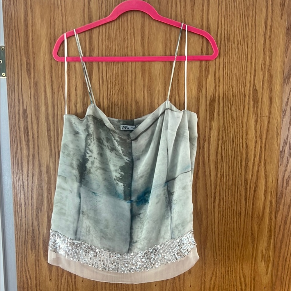 Zara Camisole. Sequin trim along the hem. Size Large. NWT!!